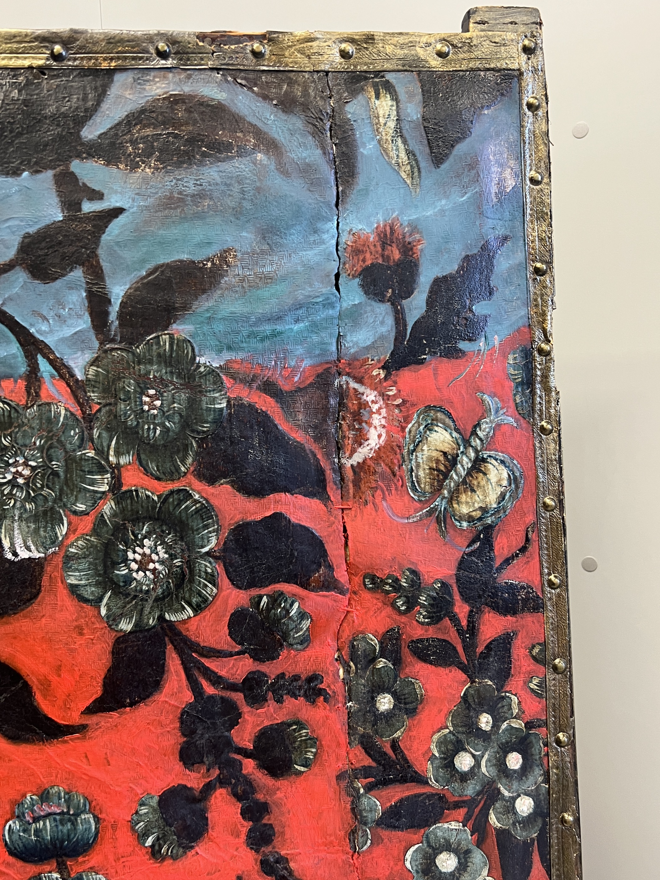 A 19th century Spanish leather three fold dressing screen re-painted by Ricardo Cinalli for the current owner, each panel width 57cm, height 175cm